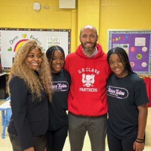 Pierce Twins give diverse reading collection to the students at GR Clark Elementary