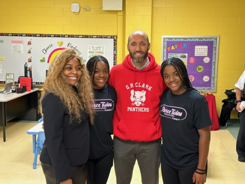 Pierce Twins give diverse reading collection to the students at GR Clark Elementary